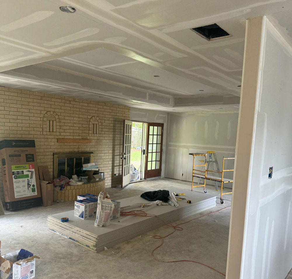 Living room interior under construction in Marion, OH showing drywall installation by a residential drywall contractor